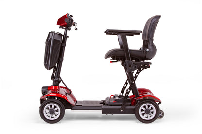 The EW-26 Folding Scooter by E-Wheels is a red, lightweight mobility scooter with a foldable design. It features a padded seat, armrests, and four wheels. Shown side-view on a white background, it's powered by an efficient lithium-ion battery for extended travel.