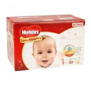 A red and white box of McKesson's Huggies Little Snugglers Baby Diapers features a smiling baby. Designed for sensitive skin, it contains 92 hypoallergenic size 2 diapers.