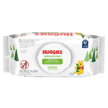 A pack of Huggies Natural Care Baby Wipes - Unscented from Kimberly Clark displays Winnie the Pooh, emphasizes "hypoallergenic & fragrance-free" and "99% purified water," ideal for newborn skin, with tree imagery and a "Do Not Flush" warning.