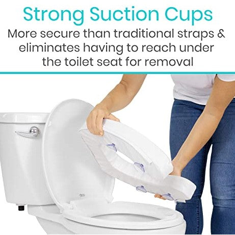 A person easily lifts the Vive Health Toilet Seat Cushion 4'' Soft, which features strong suction cups and soft foam for comfort. The design ensures a secure attachment without the hassle of reaching underneath for removal.