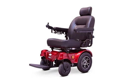 The red EW-M51 Power Chair by E-Wheels features a cushioned black seat and headrest, right-armrest joystick control, four small wheels for mobility and stability, and rear-wheel-drive for smooth navigation.