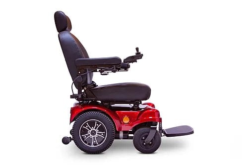 The EW-M51 Power Chair by E-Wheels in bold red is shown in side profile, highlighting its black seat and headrest. It has a rear-wheel-drive system for better maneuverability, large rear wheels, smaller front wheels, adjustable armrests, and a joystick control on the right armrest.