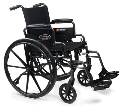 The Traveler L4 by Graham Field is a black, lightweight wheelchair featuring a quick release axle with large rear wheels, smaller front wheels, and adjustable footrests. It is designed for comfort with its cushioned seat and padded backrest.