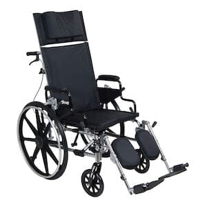 Displayed against a plain white background, the Viper Plus Full Reclining Steel Wheelchair by Drive Medical is a black, foldable reclining wheelchair designed for mobility assistance. It features large rear wheels, small front wheels, adjustable leg rests, and a high backrest for added support.