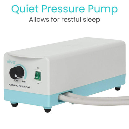 The Vive Health 5'' Alternating Pressure Pad, ideal for preventing bedsores and ensuring restful sleep, is a white and light blue rectangular device. It features a customizable firmness dial from "Soft" to "Firm," a green power switch, and connects to your pressure mattress via a tube.