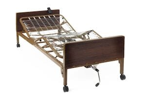 The Medline Bed Semi Electric Basic is a hospital homecare bed frame with adjustable sections, featuring a metal grid support structure. It allows the head and foot areas to be elevated and includes built-in safety features. Mounted on wheels for easy mobility, this semi-electric bed is equipped with an intuitive hand crank located at the bottom.