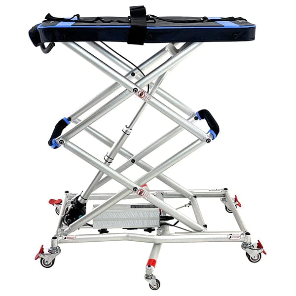 Introducing the So Lite Portable Lift by Journey Health & Lifestyle, a silver aluminum stretcher designed with a scissor lift mechanism. It features a black padded surface and adjustable height, along with red locking caster wheels for seamless mobility and stability, making it an ideal portable lift solution in various settings.